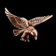 Aguila. Colgante de bronce